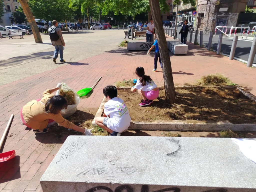 9 maggio 2026 Roma Cura Roma - pulizia piazza aiuole alberi Piazza Margherita Hack, largo Ettore Rolli, Porta Portese, Trastevere, Roma